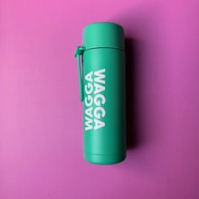 Load image into Gallery viewer, Green drink bottle 'WAGGA WAGGA' text on a pink background
