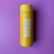 Load image into Gallery viewer, Yellow drink bottle with 'WAGGA WAGGA' text on a purple background
