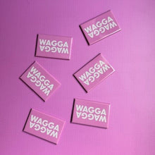 Load image into Gallery viewer, Pink rectangular magnet with 'WAGGA WAGGA' text on a pink background
